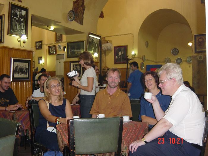 In the coffee house: Chryssy, Gerhard, Kari and Markku